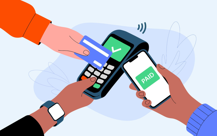 Smartfon z aktywnym portfelem elektronicznym leżący obok plastikowej karty płatniczej, symbolizujący nowoczesny pieniądz bezgotówkowy i cyfrowy zapis wartości.